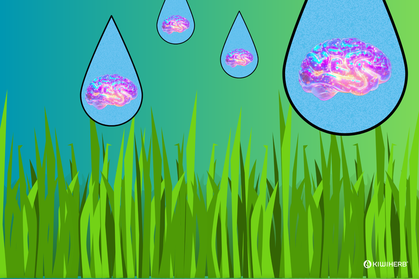 rain drops of water with metallic brains in them dropping onto green grass