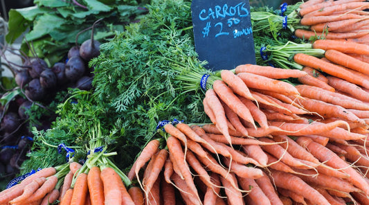 Organic carrots and beetroots for sale at local farmer's market. 